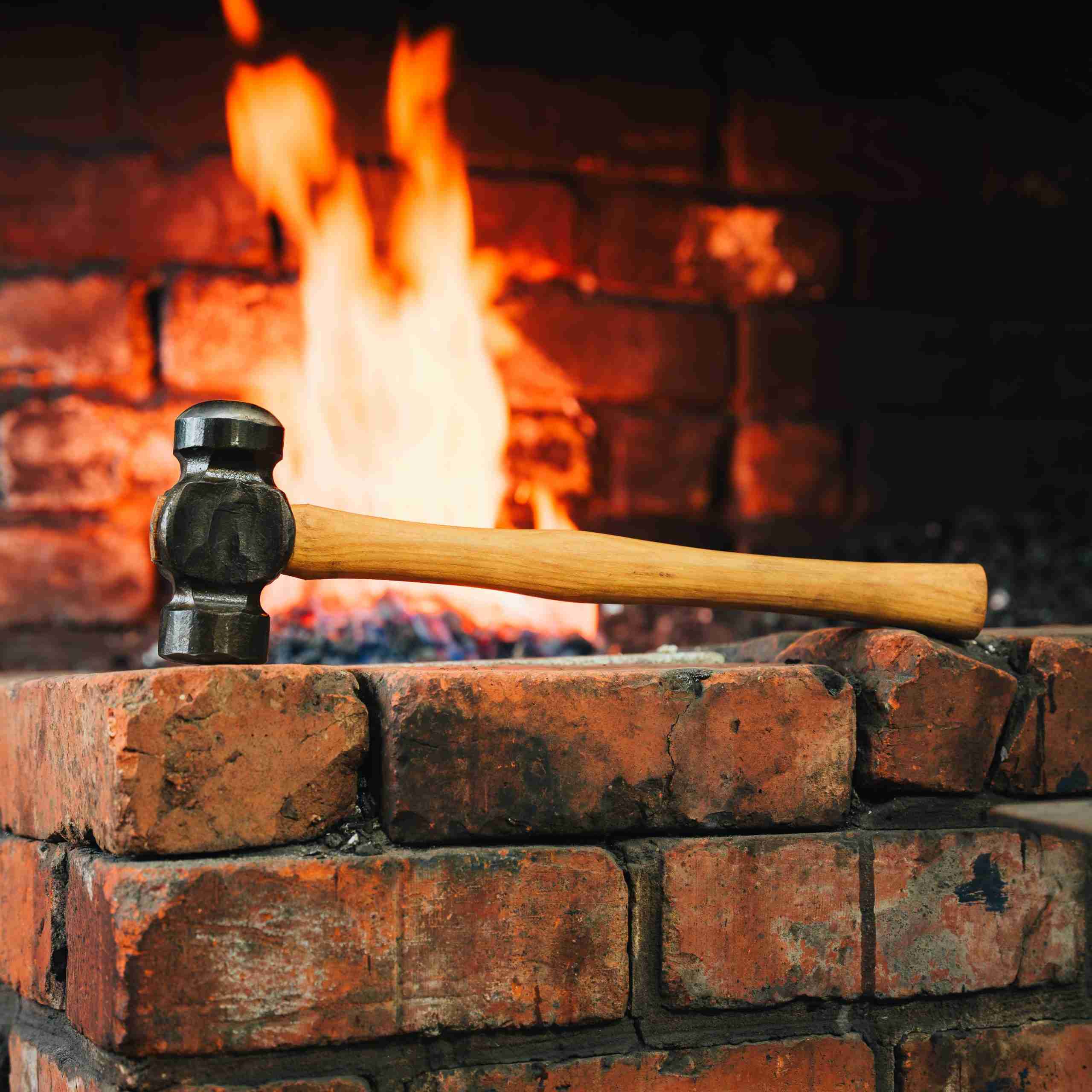 hammer in front of the fire