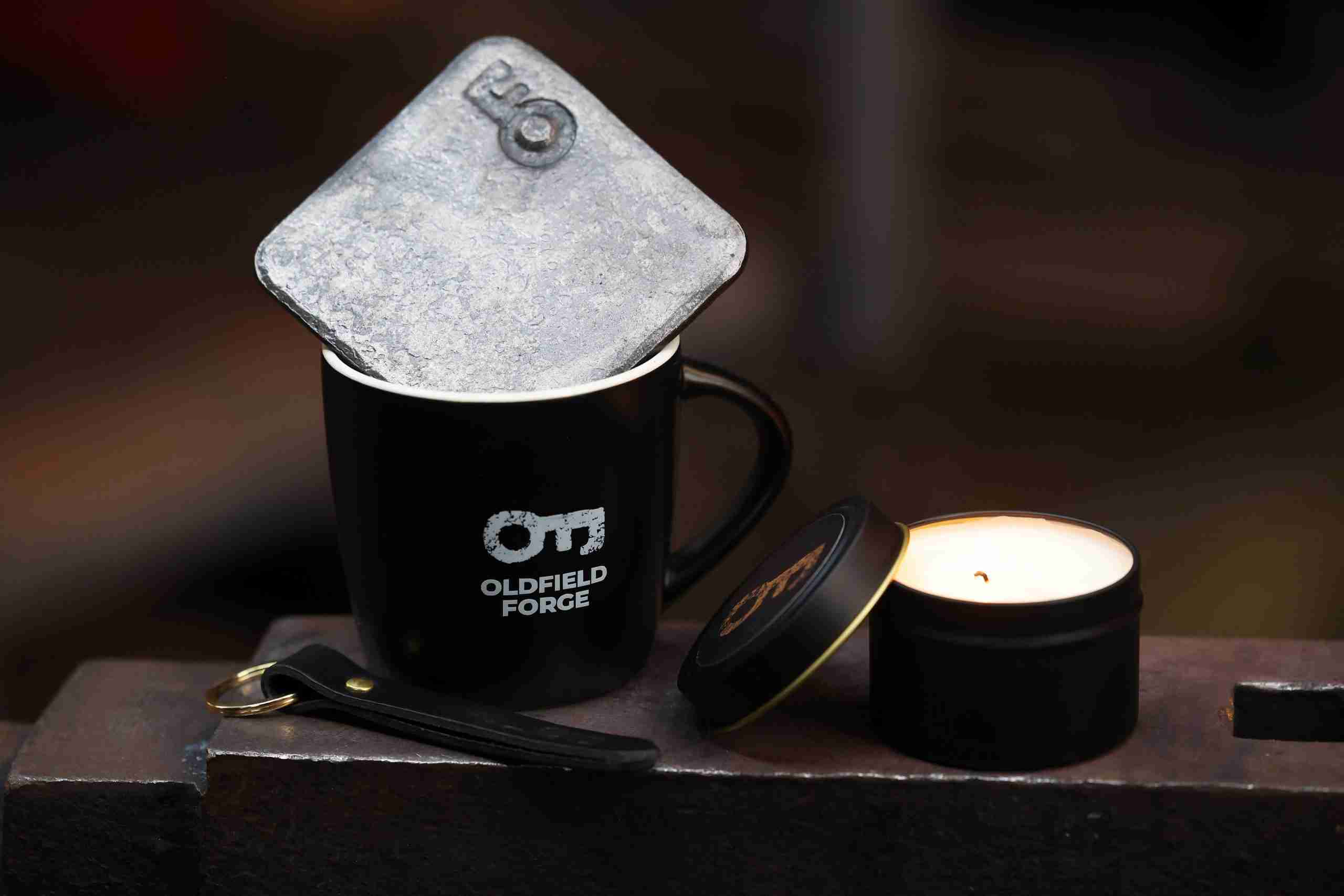 Chine mug, leather handmade keyring, scented candle and handmade coater with logo.